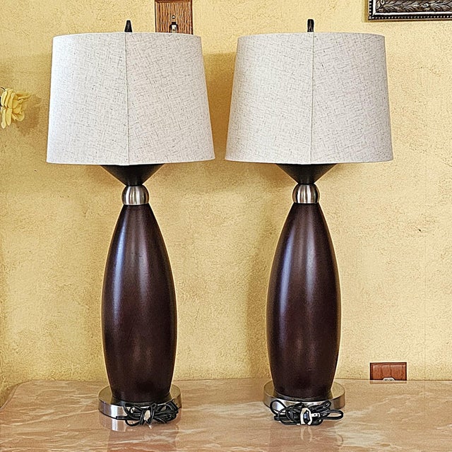 Contemporary Pair of Contemporary Espresso Wood Hourglass Lamps With Brushed Nickel Accents and Linen Shades For Sale - Image 3 of 18