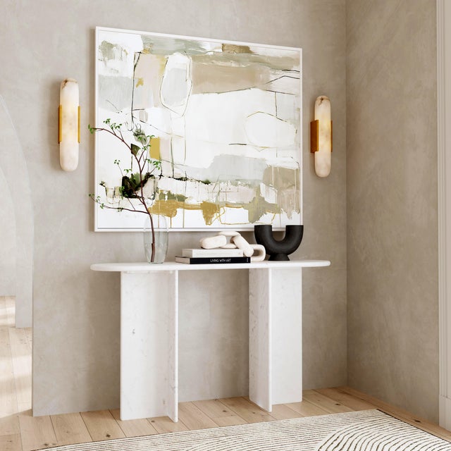 Elevate your entryway or living room with the timeless sophistication of this Butler Specialty Company Vienna all-marble...