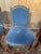 Set of four Napoleon III chairs in blackened and gilded wood, upholstered in blue and red velvet. Some gilding is missing....