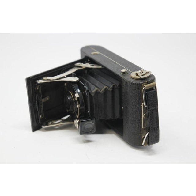 Collectible antique 1920s Kodak film camera in hard leather case. With original leather case stamped made in Belgium....