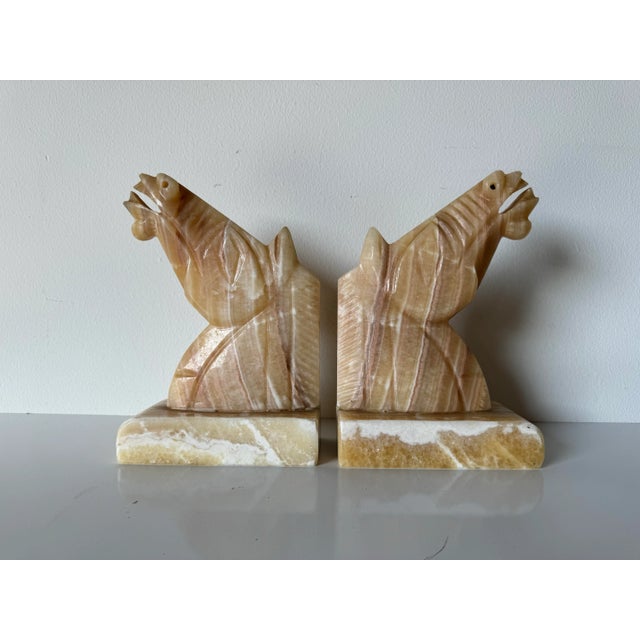 Gorgeous beige colored marble horse head bookends a pair . Starting with a simple clean lined base with a rounded front....
