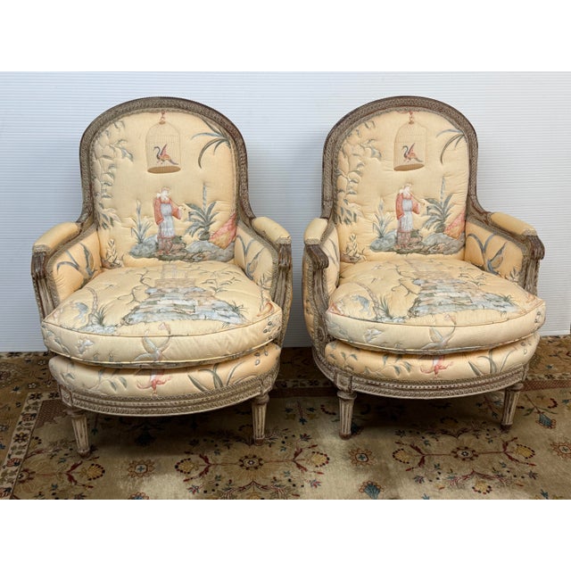 Design Plus Gallery presents a Pair of Bergere Chair with Delmar Upholstery from the 18th Century. The chair have a French...