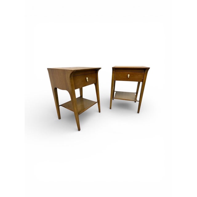 This elegant pair of Mid-Century Modern Drexel “Profile” nightstands, designed by John Van Koert, exemplifies refined...