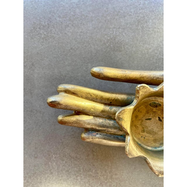 Contemporary Zodax Buddha Hand Candle Holder Chairish