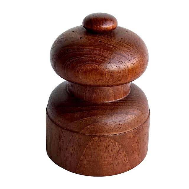 Offered is a mid 20th Century Teak wood Model No. 1616 combination salt shaker/pepper mill designed by Jens H. Quistgaard...