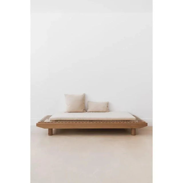 Dena wool ecru daybed by la lune dimensions: d 75 x w 200 x h 31 cm. Materials: oak and wool. Oak structure, mattresses...
