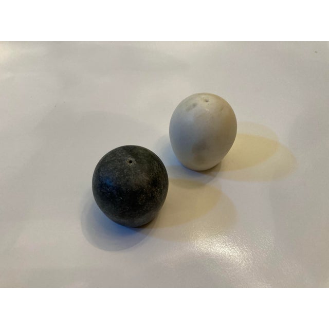 Modern salt pepper shakes in gray/white marble for crate&barrel single opening on both refill on bottom