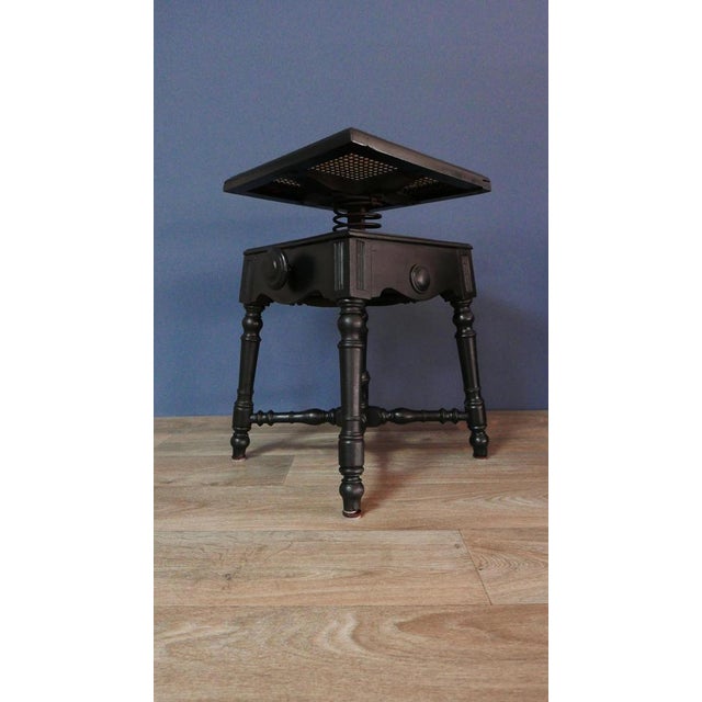 Antique Stool in Oak with Raffia Seat and Cast Iron Frame, 1890s, in Good conditions. Designed 1890 to 1919