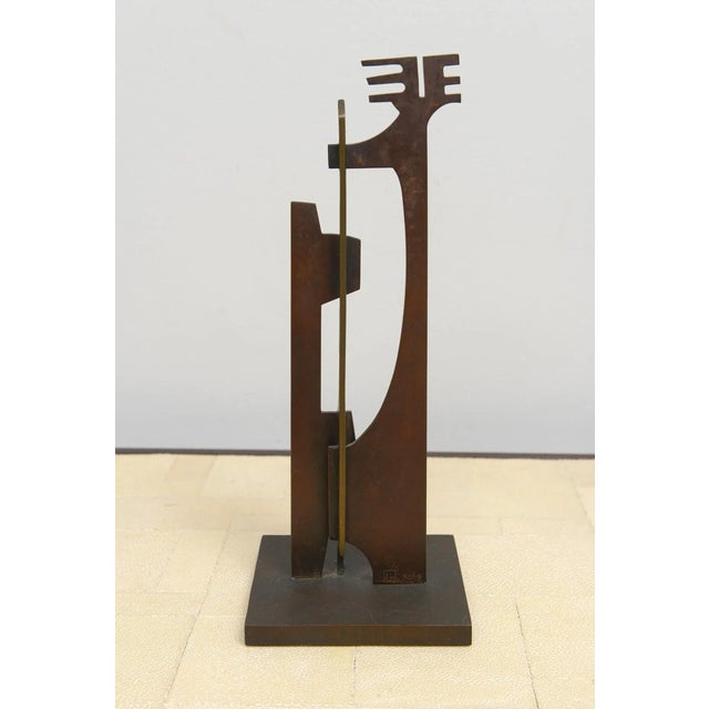 Arnaldo Ugarte "Family: Mother, Father & Child" Bronze Sculpture Base is W 4" x D 4". Signed and dated 2013. Ugarte, born...