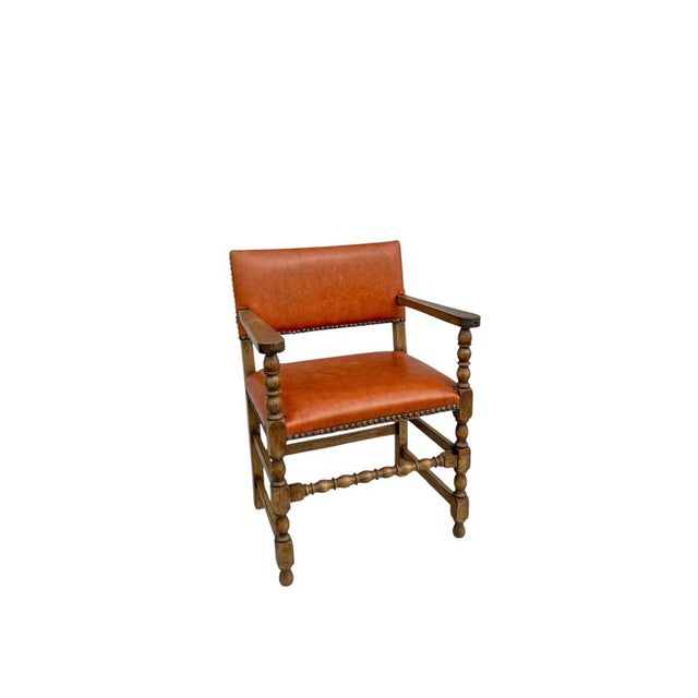 English Arts & Crafts Beech Armchair with Leather Upholstery, ca 1915. This chair features a beech frame with finely...