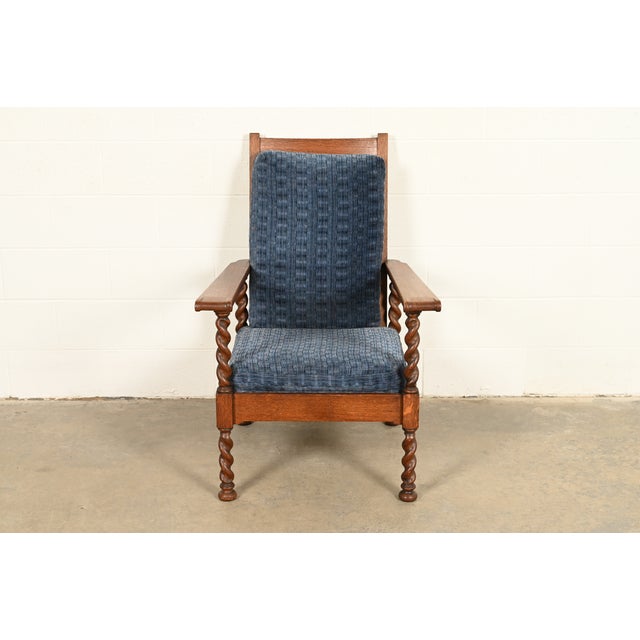 A beautiful antique Arts & Crafts or English Jacobean style barley twist lounge chair By Stickley Brothers USA, Circa...
