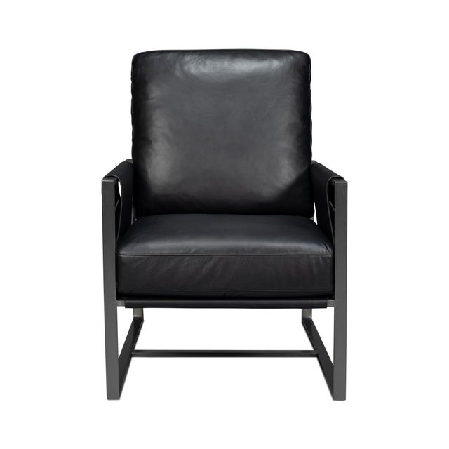 Upholstered in rich, top-grain Onyx black leather, this chair boasts a sleek industrial metal frame for a contemporary...