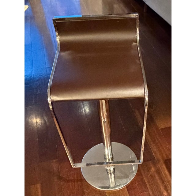 Classic sleek modern Barstools provide comfort & can swivel . Wonderful for tight spaces. Their metal leg support bars are...
