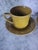 Set-4 pieces. 1980s stoneware coffee mugs and saucers made in the USA. These are in traditional vintage colors with a...