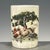 A charming Chinese porcelain brush pot (bitong). The cylindrical vessel features a creamy, all-over crackle glaze and is...