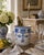 A handsome late-20th-century Italian porcelain ice bucket, hand painted in deep cobalt blue against a warm white ground....