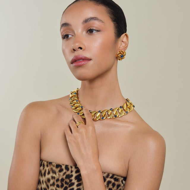 Introducing the Angelique Studs, meticulously crafted from semi-precious stones. These studs feature a unique flower...