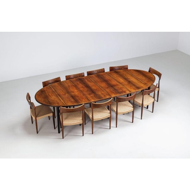 Arne Vodder Model 212 oval dining table in Santos rosewood, produced by Sibast Møbler, Denmark 1960s. A beautifully...