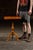 Tilt-top side table in flamed maple with turned column and cabriole tripod base. Crafted from figured maple with a fiery...