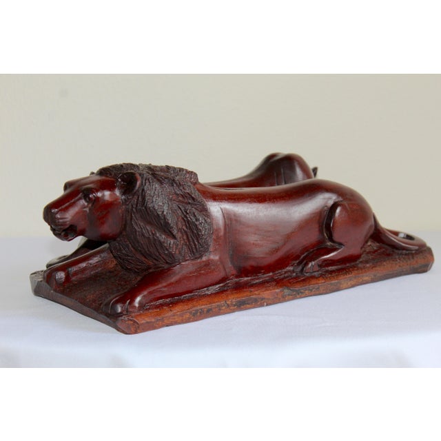 Celebrate the timeless beauty of African wildlife with this exceptional vintage hand-carved sculpture depicting a majestic...