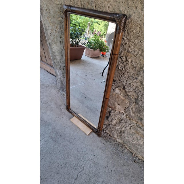 The mirror is in excellent condition and not dulled. The bamboo is in excellent condition considering the age.