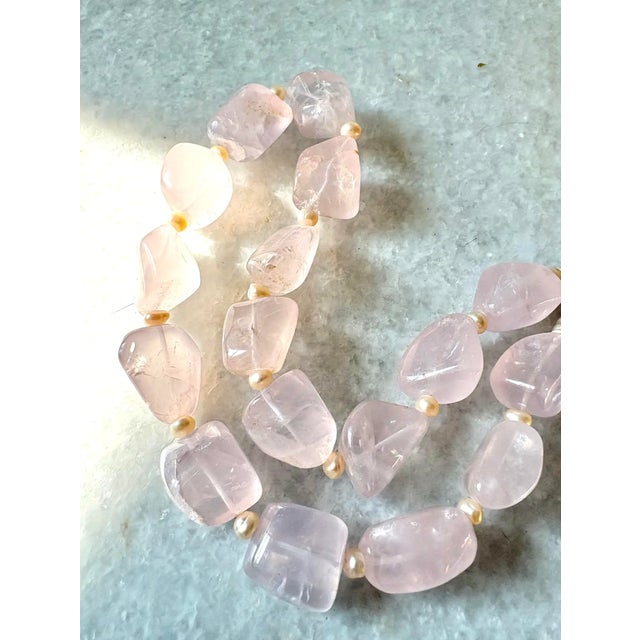 Gorgeous, vintage chunky rose quartz beaded necklace with freshwater pearl spacers and sterling silver clasp.