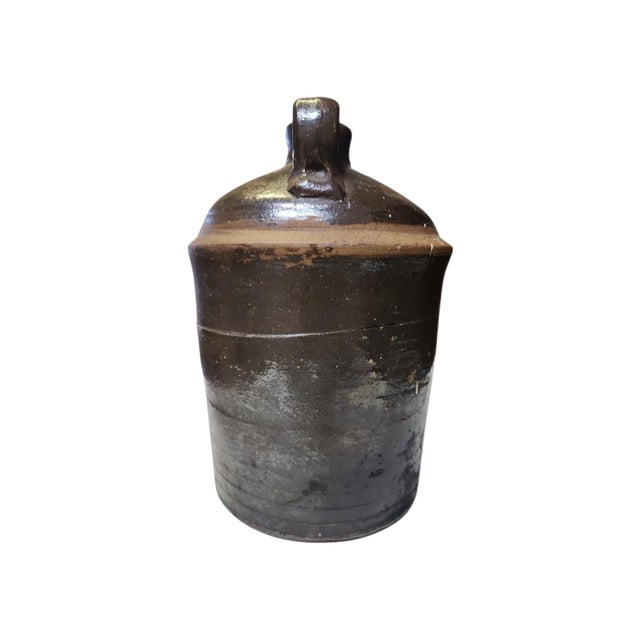 Terrific 19th century brown Albany slip glaze stacker jug, in excellent condition, atrributed to Atlanta, Georgia, Brown...