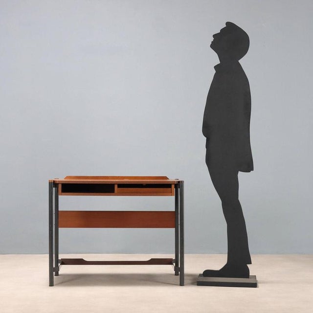 Vintage dressing table with black enamelled metal legs, stained mahogany veneer top with open compartment and compartment...