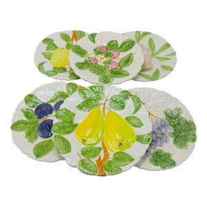 Vintage Set of Decorative Plates in Complimenting Floral Designs