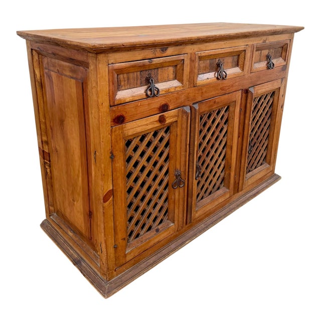 Charming Spanish sideboard crafted in solid pine, characterized by its warm natural finish and traditional rustic...
