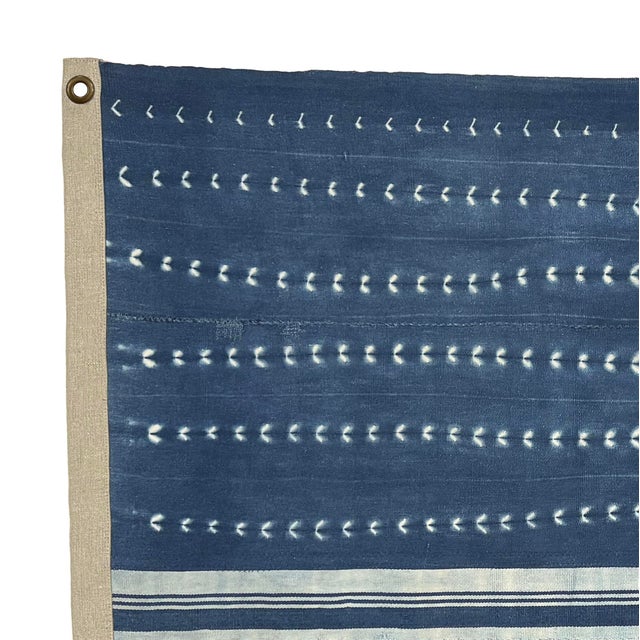 This unique cotton flag is made from vintage African textiles. The shibori dye and hand-stitching are original, and...