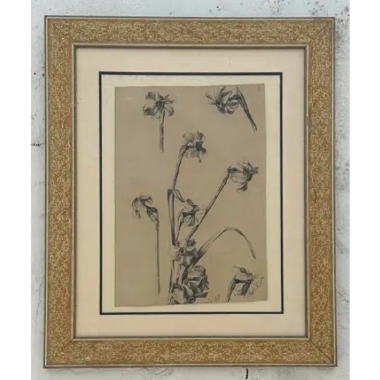 A vintage botanical sketch on paper in a beautiful frame, evokes a timeless and natural elegance, often combining fine...