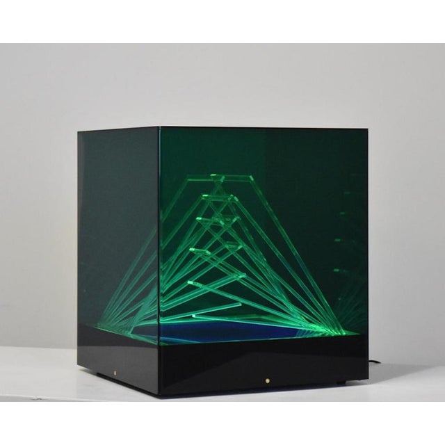A rare light sculpture called "Teo's Cube," designed by James Rivière in the 1970s and produced by the Centro Ricerche di...