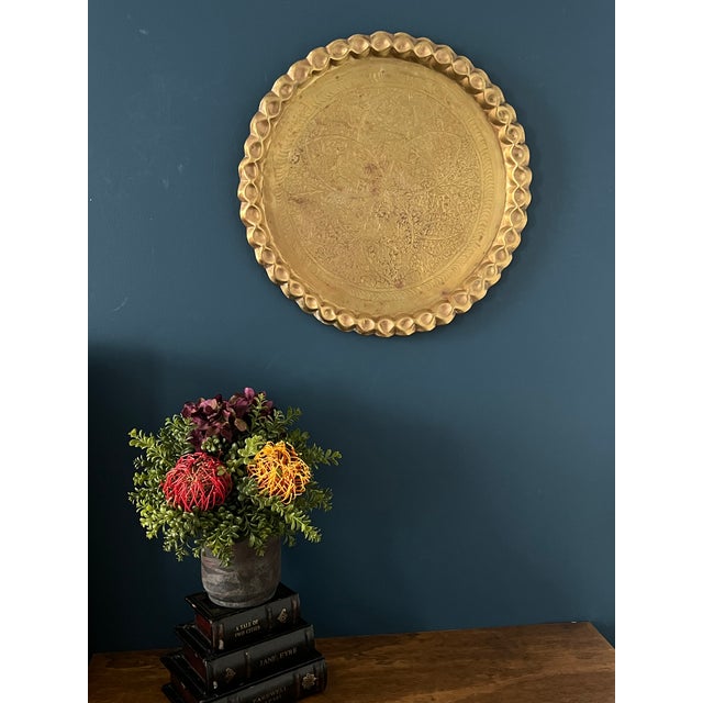 This is a magnificent antique hand-engraved brass tray/ wall hanging likely dating from the late 19th to early 20th...