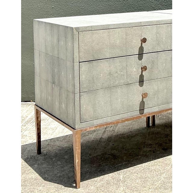 This pair of vintage nightstands epitomizes mid-century luxury through a sophisticated use of texture and tone. Each chest...