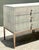 This pair of vintage nightstands epitomizes mid-century luxury through a sophisticated use of texture and tone. Each chest...