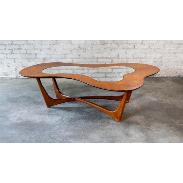 Mid Century Modern biomorphic walnut coffee table by Erno Fabry for Fabry Associates, circa 1950s. Biomorphic, amoeba...