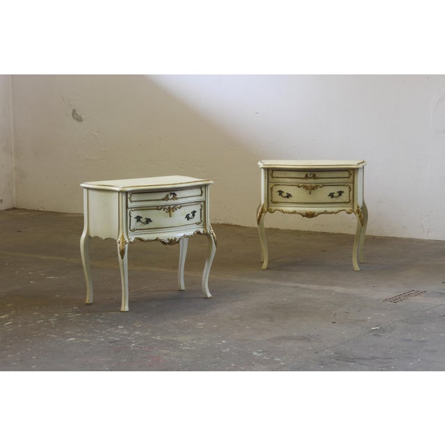 Pair of 20th Century Lacquered and Painted Wood Venetian Nightstands A rare and beautifully preserved pair of Venetian-...