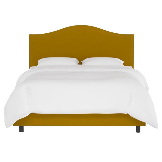 This fully upholstered bed has a unique headboard shape, allowing you to chart a course for a bedroom retreat that is at...