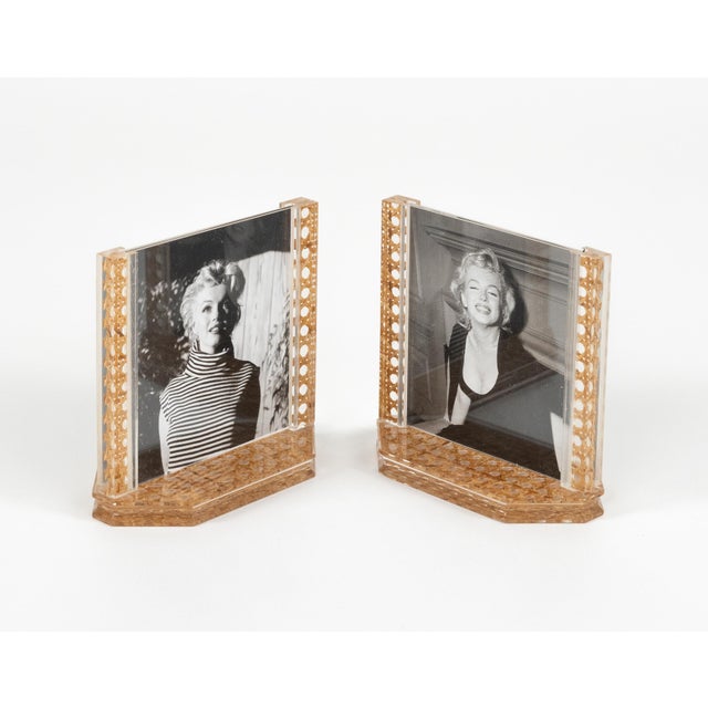 Midcentury beautiful pair of picture frames in acrylic and rattan in the style of Christian Dior Home. Made in Italy in...