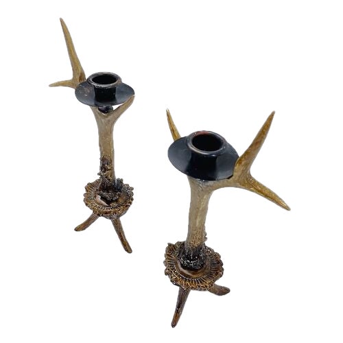 Pair of vintage composite and steel faux antler candle holders. No maker's marks.