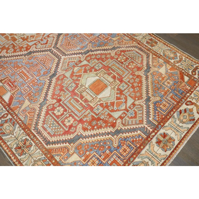 a 20th century Persian Bakhtiari Double medallion rug