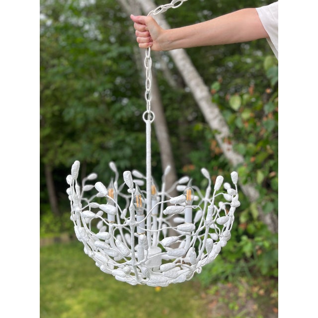 The Landon 4 arm chandelier is nestled in a beautiful half sphere of weird and wonderful weeds. This luscious ceiling...