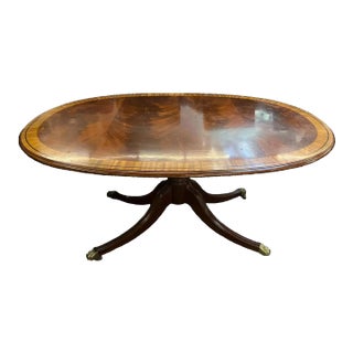 Mid 20th Century Karges Flame Mahogany Oval Dining Satinwood Banding Brass Paw Feet on Casters For Sale