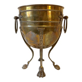 Early 20th Century Brass Over Copper Jardiniere With Paw Feet For Sale