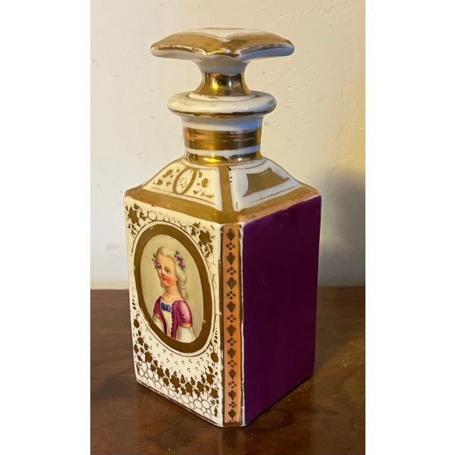 Antique 19th century Paris porcelain perfume bottle decorated with a hand painted portrait. Richly gilt with apricot...