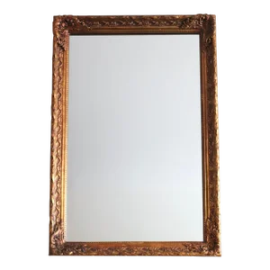 1970s Carved Floral Wood Mirror Finished in Gold Gilt