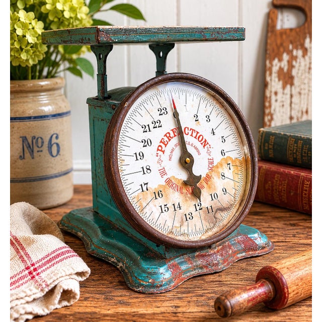 An authentic early 20th-century Triner “Perfection” Family Kitchen Scale featuring its beautifully aged original aqua...