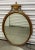 Discover the timeless elegance of this stunning antique French Neoclassical mirror. This exquisite piece features a...