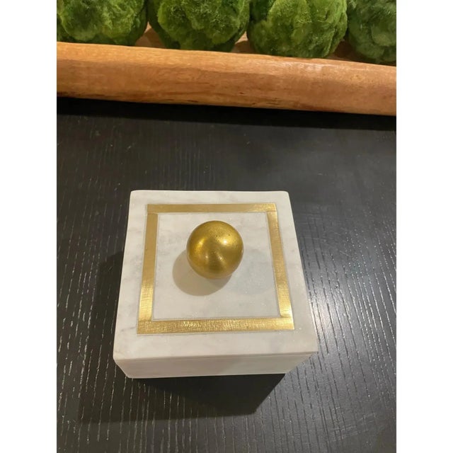 Offered is a white marble trinket box with gold details. Versatile size to use in any space in your home.